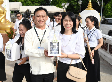 บุคลากร กพน. ร่วมถวายเทียนพรรษาและเครื่องไทยธรรม ... พารามิเตอร์รูปภาพ 9