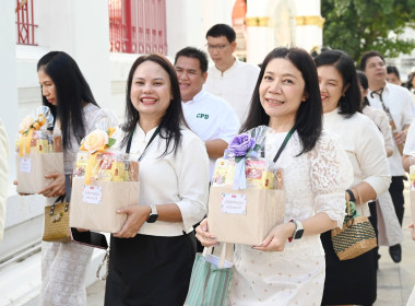 บุคลากร กพน. ร่วมถวายเทียนพรรษาและเครื่องไทยธรรม ... พารามิเตอร์รูปภาพ 7
